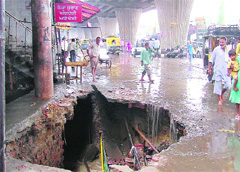 A stretch of old GT Road caved in in Ludhiana on Friday.