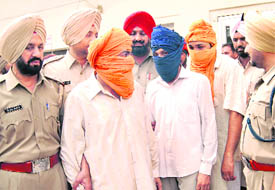 Suspected terrorists of Khalistan Zindabad Force in police custody at Jagraon on Friday.