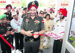 Lieutenant General J.P. Singh inaugurates Ex-Servicemen Contributory Health Scheme polyclinic building at Ropar on Saturday.