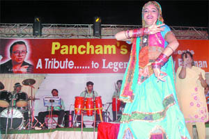 Children present a dance programme at a function organised by the Pancham's Fan Club to pay tribute to the legendary singer Rahul Dev Burman on the occasion of his 69th birth anniversary in New Delhi on Friday.