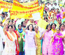 Members of the women cell of the Haryana Janhit Congress (BL) hold a protest against the Nissing rape case in Karnal on Saturday.