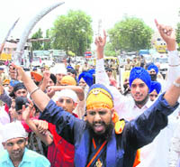 Sikhs protest against Dera Sacha Sauda chief Gurmeet Ram Rahim Singh in Kurukshetra on Saturday.