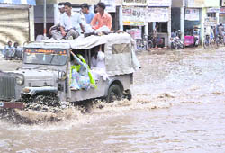The Loharu road in Bhiwani after rain on Saturday.