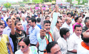 Members of various Hindu organisations protest against the PDP over the SASB land row in Jammu on Saturday. 
