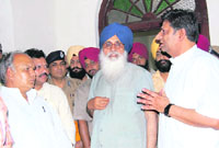 Mahinder Singh Kaypee (left) and Ashwani Shekhri (right) during a meeting of a Congress delegation with Chief Minister Parkash Singh Badal in Amritsar on Saturday.