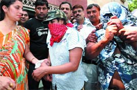 Bhojpuri actress Hema and Nigerian citizen Pius Onwaso Okolonta held by the Delhi Police in New Delhi on Sunday.
