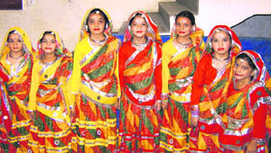 Students await their turn to perform during a summer camp organised by Rajeshwari Kala Mandir in Ludhiana. 