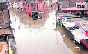 An aerial view of submerged Sirki Bazar roads after Bathinda received heavy rainfall on Sunday morning.