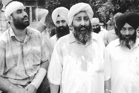 People throw stones at ward number 24; (right) two persons that were hurt in the stone-pelting incidence in Rajpura on Monday.