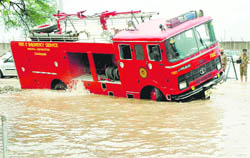 A fire tender, pressed into service for dewatering, was stuck at the Chandigarh airport parking lot on Monday.