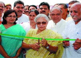 Delhi Chief Minister Sheila Dikshit along with Delhi industry minister Mangat Ram Singhal inaugurates the urs camp at Burari Ground in New Delhi