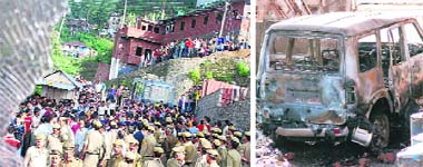 Employees of Virgo Metallic Appliances protest outside the factory at Shoghi on Monday; and (above) a vehicle torched by the agitating workers