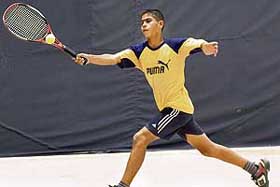A player in action during a match of the AITA Total Tennis Talent Series on the PAU campus in Ludhiana on Monday.