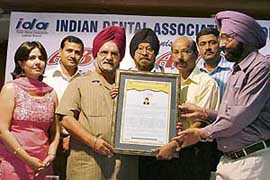 Dr Bhagwant Singh being felicitated by the Indian Dental Association, Ludhiana branch, on Monday.