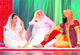 Artistes portray Moran and Maharaja Ranjit Singh in the play, Moran Sarkar, organised at Punjab Naatshala in Amritsar on Monday.