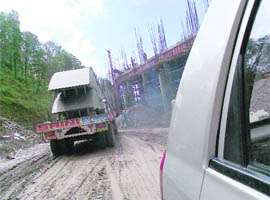 A view of the Bhuntar bridge which was damaged by an overloaded trala