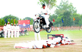 Daredevils present stunts during the passing-out-parade held at the PAP complex in Jalandhar on Tuesday.