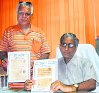 Senior Superintendent post offices V.K. Raizada at a press conference in Ludhiana 