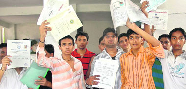 The students seeking admission under the sports category protest in the auditorium on the opening day of the centralised admission to Class XI in Chandigarh on Wednesday.