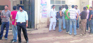 Bouncers outside a polling booth at Zirakpur.