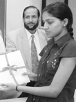 A student with her scholarship certificate during a function at CIIS in Mohali on Wednesday.