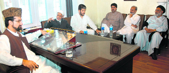 Chairman of the moderate faction of the All-Party Hurriyat Conference Mirwaiz Umar Farooq holding a general body meeting after the land revocation order in Srinagar on Wednesday.