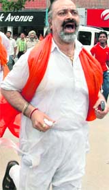 A VHP volunteer protests in Sector 17 of Chandigarh against the cancellation of land allotment to the Amarnath Shrine Board