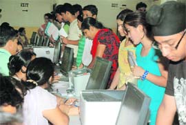 Students await their turn at admission centre in Government Model Senior Secondary School, Sector 10, Chandigarh on Thursday. 