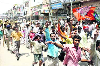 Activists of the Sangh Parivar hold a protest in Rohtak on Thursday.