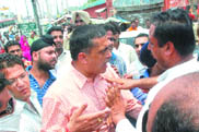 Activists of various Hindu organisations argue with BJP MLA K.D. Bhandari on a point