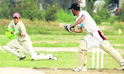 Wicketkeeper grabs the ball during a semifinal of the Ludhiana District Twenty20 Cricket Tournament (u-19) at Government Polytechnic Institute, Ludhiana, on Thursday.