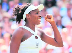 US Venus Williams celebrates after winning her semifinal match of the 2008 Wimbledon championships against Russia's Elena Dementieva at The All England Tennis Club in southwest London, on Thursday. Williams won 6-1, 7-6. 