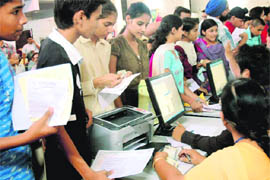 Students during Class XI admission-counselling process at GMSSS-10, Chandigarh, on Friday. 