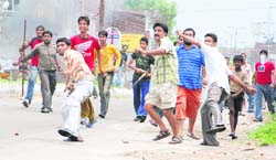 The fourth day of curfew in Jammu saw violent clashes between protesters and the police at Bantalab, on the outskirts of the city, on Friday.