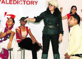 Students of ICFAI National College stage a play during the annual summer internship programme at Punjab Trade Centre in Ludhiana on Friday.