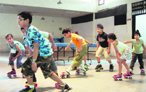 Students of Rjeshwari Kala Mandir school take part in the skating competition on the concluding day of the summer camp in Ludhiana on Friday.