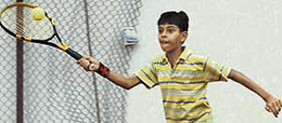 A player in action during AITA Tennis Championship at Manav Mangal Smart School, Phase 10, in Mohali on Saturday.