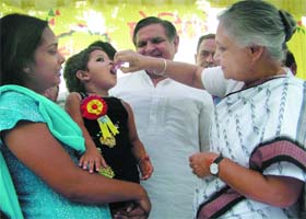 Delhi Chief Minister Sheila Dikshit launches the intensified pulse polio Immunisation programme at her residence