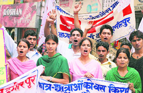 SCVT students hold a protest march demanding recognition of SCVT courses by the state government and amendment to recruitment and promotion rules, in Hamirpur on Saturday.