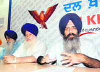 Kanwarpal Singh Bittu (right), along with senior leaders of the Dal Khalsa, addresses a press conference in Amritsar on Saturday.