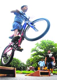 A young cyclist in action during a freestyle stunt competition in Chandigarh