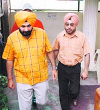 Amritsar MP and former cricketer Navjot Singh Sidhu arrives at the hospital to meet his wife in Patiala
