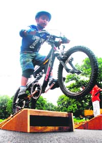 A young cyclist during a free style stunt competition at Firefox Bikes station in Sector 22 of Chandigarh