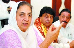 PPCC chief Rajinder Kaur Bhattal addresses a press meet in Jalandhar on Sunday. 