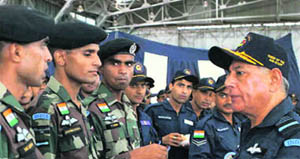 Air Chief Marshal FH Major interacts with members of the IAF team that is leaving for the Red Flag exercise in the USA at Air Force Station in Pune on Sunday. 