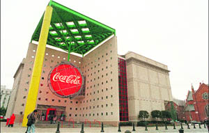 This file photo shows a view of Coca-Cola headquarters in Atlanta, Georgia. Coca-Cola has agreed to pay $137.5 million to settle a stockholder lawsuit accusing it of price inflation, The Wall Street Journal reported on Sunday on its website. 