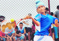 Bhavtarnpreet Singh returns a shot during the AITA championship at Manav Mangal Smart School, Phase-X, Mohali