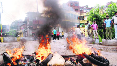 Despite imposition of a curfew, people protesting in Jammu on Monday.