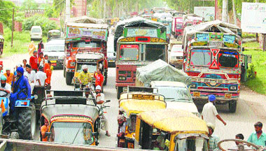 Upset over bridge collapse and the resulting inconvenience, Sultanwind residents block traffic in Amritsar.