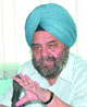 Baljit Singh Lalli addresses a press meet in Jalandhar.